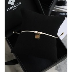 Placa amuleto oro 18kt pulsera