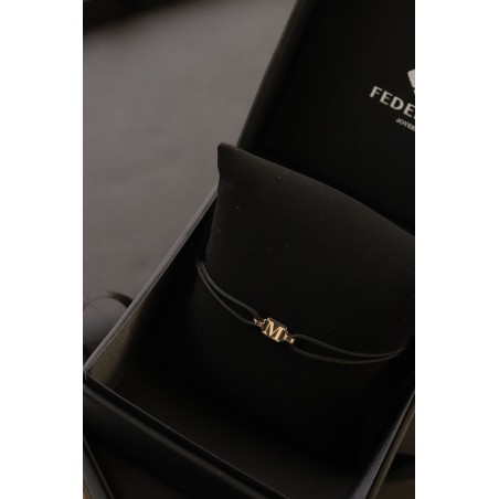 Tag inicial bracalet oro de 18kt