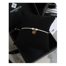 Placa amuleto oro 18kt pulsera