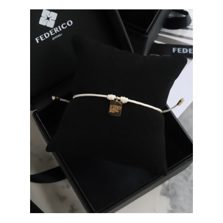 Placa amuleto oro 18kt pulsera