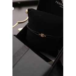Tag inicial bracalet oro de 18kt