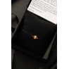 Cruz pulsera oro18kt
